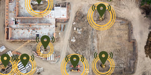 Ariel view of construction site with gps software icons showing location of assets